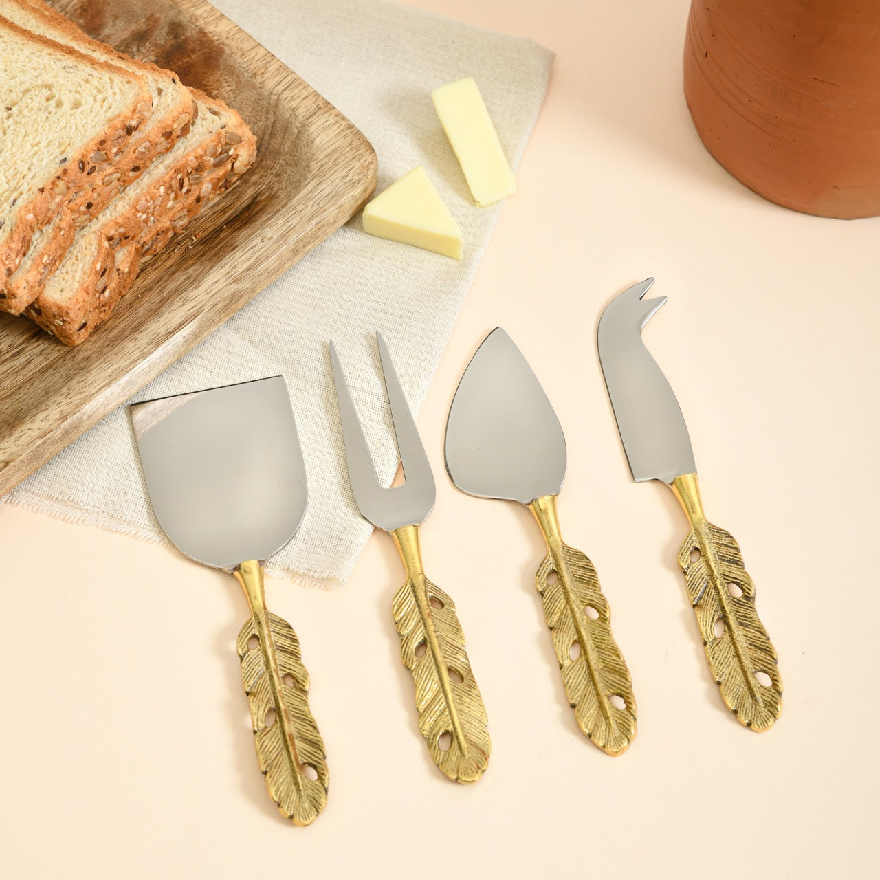 Brass 4 - piece Cheese Knife Set | Punkh - Feather Handle